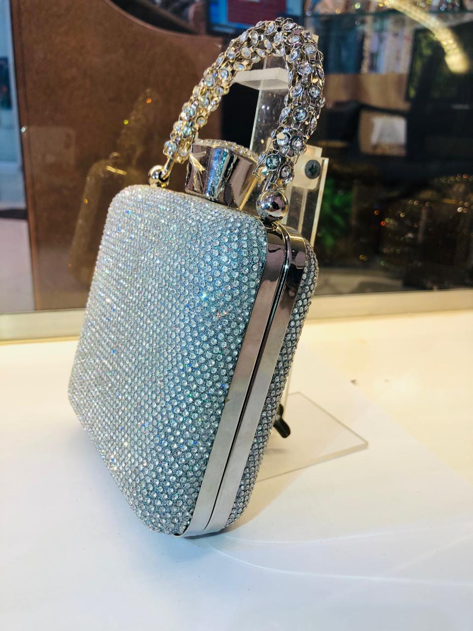 Armani dust clutche